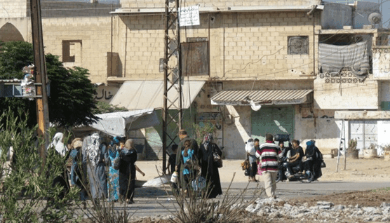 Residents of Aleppo Flee Amidst Ongoing Battles in Syria